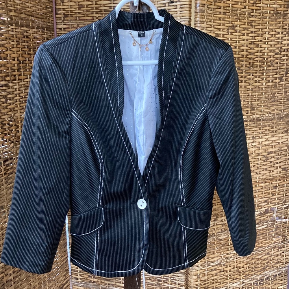Bebe size 10 fashion blazer with laced up back.